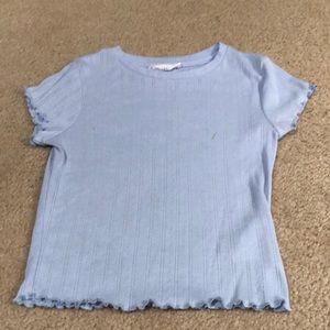 Light blue top